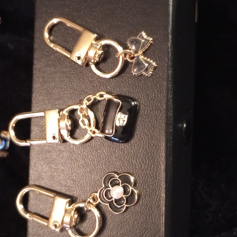 Bag charms 3 adorable black and gold toned new